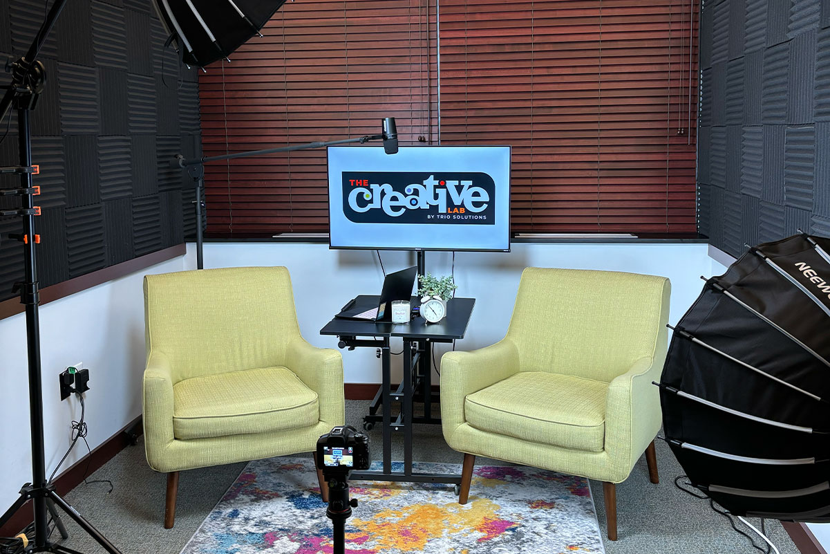 Two chairs setup for an interview or podcast in a studio